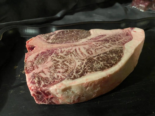 100% All-Natural American Wagyu Porterhouse T-BoneWagyu Porterhouse T-Bone is a premium steak that combines the rich flavors of both the tenderloin and the striploin, offering a delightful dining experience. This cu-Natural American Wagyu PorterhouseThe Hufeisen-Ranch (WYO Wagyu)