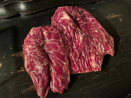 100% All-Natural Grass-fed American Wagyu Hanging Tender "Butcher's CuThe Wagyu Hanging Tender, also known as the Hanger Steak or Onglet, is a prized cut known for its rich flavor and tender texture. It is sourced from the diaphragm mu100%The Hufeisen-Ranch (WYO Wagyu)