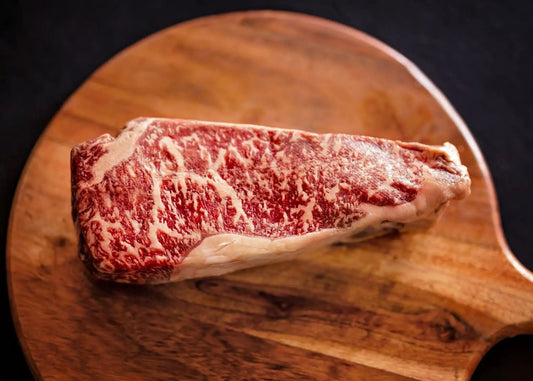 100% All-Natural Grass-fed American Wagyu New York StripWagyu New York Strip is a premium cut of beef known for its exceptional marbling, tenderness, and rich flavor. It is sourced from the loin section of the Wagyu cattl100%The Hufeisen-Ranch (WYO Wagyu)