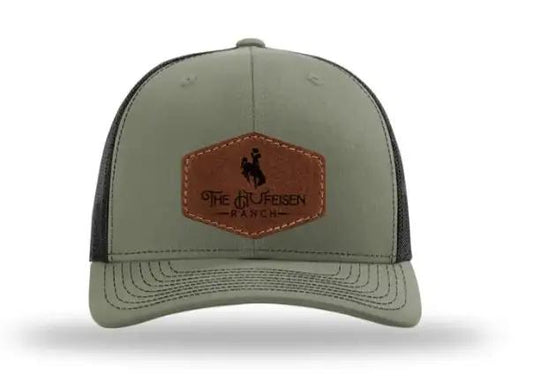 Hufeisen Ranch Throwback Leather Patch HatThank you for supporting our Ranch!! 

Introducing the Richardson 112 Trucker Snapback - The Ultimate Blend of Style and Comfort
Elevate your hat game with the RichaHufeisen Ranch Throwback Leather Patch HatThe Hufeisen-Ranch (WYO Wagyu)