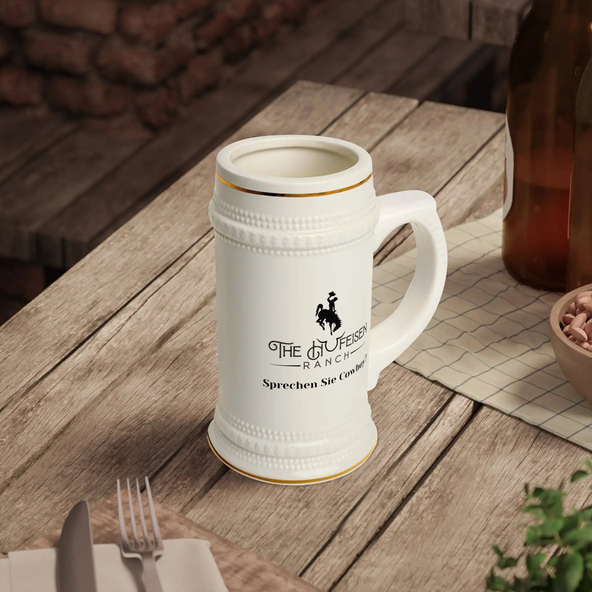 Sprechen Sie Cowboy Beer Stein MugRaise your stein and tip your hat to a unique blend of Old West grit and Bavarian charm with our 'Sprechen Sie Cowboy' Beer Stein. This ruggedly handsome stein bringSprechen Sie Cowboy Beer Stein MugThe Hufeisen-Ranch (WYO Wagyu)Mug